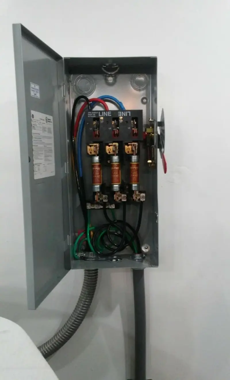 Three-phase disconnect switch installed for Smoke Detector Installation in South Patrick Shores